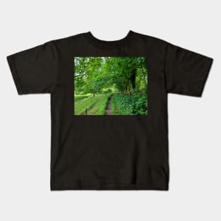 Morning walk through field and forest Kids T-Shirt